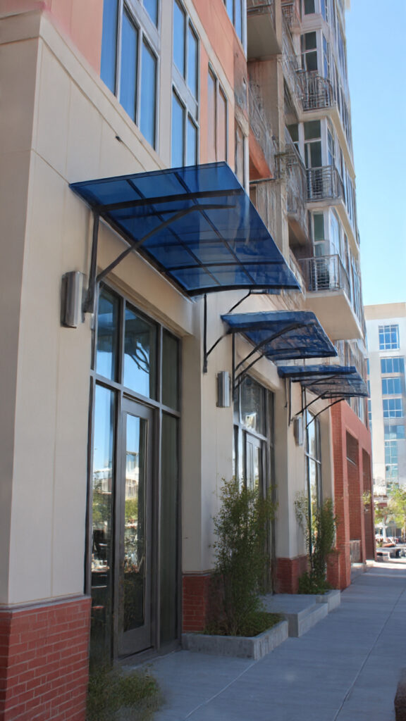 “Modern retractable awning installed over a stylish balcony by Intext India. The fabric canopy provides shade and protection from the sun and rain, with a sleek aluminum frame designed for durability and elegance. Suitable for homes, cafés, and commercial spaces across Eastern India.”